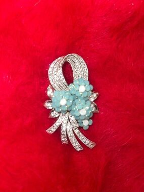 Silver-Tone Ribbon Brooch with Aqua Floral Cluster